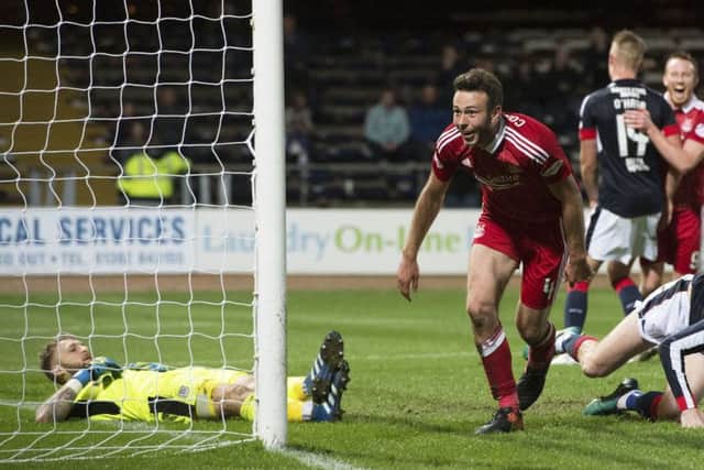 Aberdeen's Andy Considine celebrates after scoring his third goal in the rout of Dundee. Picture: Ross Parker/SNS