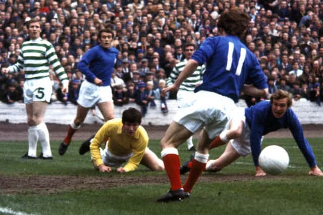 Evan Williams in the thick of the action during the 1971 Scottish Cup final against Rangers at Hampden which ended 1-1, with Celtic going on to win the replay. Picture: SNS