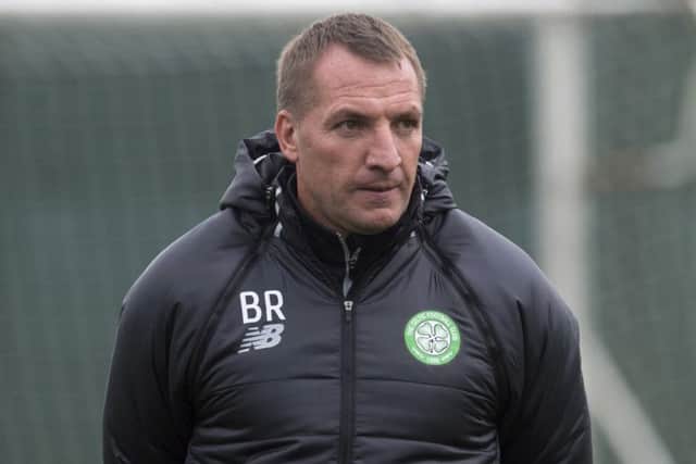 Celtic manager Brendan Rodgers will wait until after the Rangers double-header before allowing his senior players time off. Picture: SNS