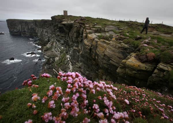 The scenery in the Orkney Islands is impressive, such as here at Marwick Head, helping to make it an attractive place to live.