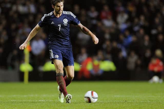 Charlie Mulgrew in action for Scotland in a friendly against England. Picture: John Devlin/SNS.