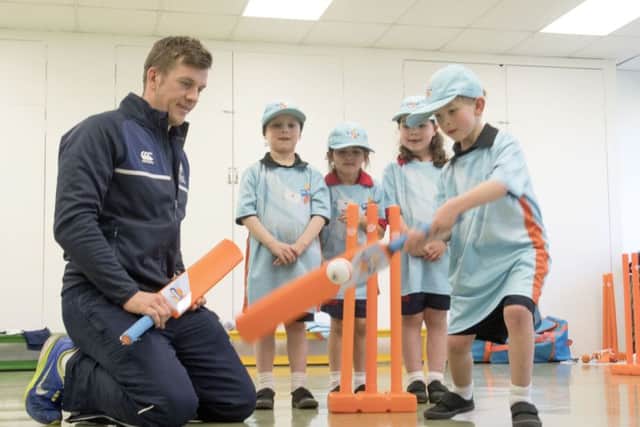 Mary Erskine School pupils are coached by Scotland internationalist George Munsey. Cameron Grant is batting, with, left to right, Max Bryce, Tara Raffan and Jessica Scholes