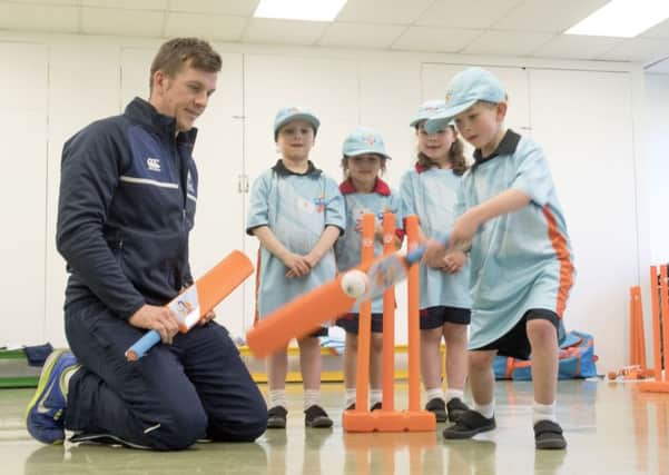 Mary Erskine School pupils are coached by Scotland internationalist George Munsey. Cameron Grant is batting, with, left to right, Max Bryce, Tara Raffan and Jessica Scholes
