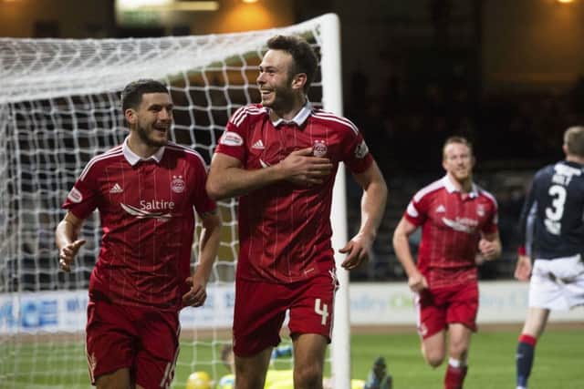 Andy Considine celebrates completing his hat-trick. Pic: SNS/
