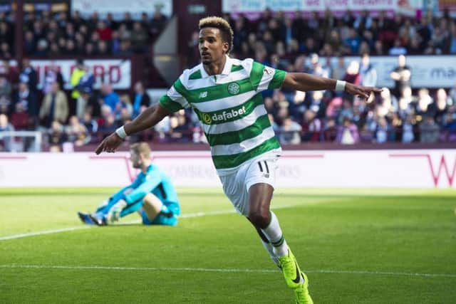 Celtic's Scott Sinclair wheels away after scoring the second goal. Picture: SNS