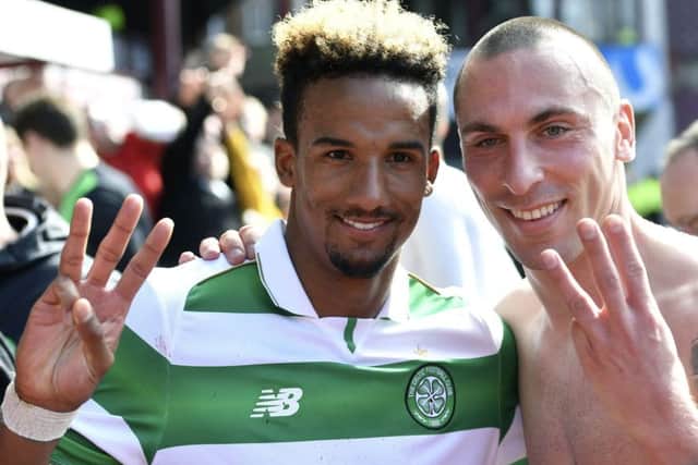 Celtic's Scott Sinclair and Scott Brown celebrate at full time. Picture: SNS