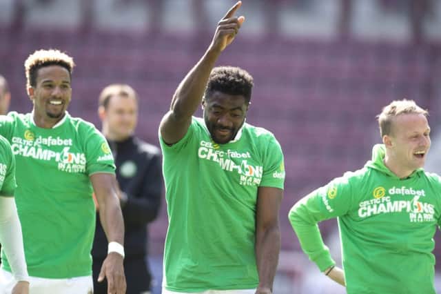 Kolo Toure celebrates after Celtic secure the Ladbrokes Premiership title. Picture: SNS
