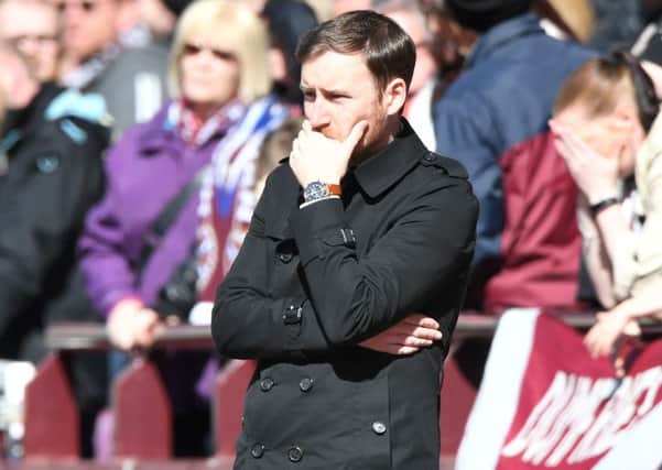Hearts head coach Ian Cathro watches on as his side lose heavily to Celtic. Picture: SNS