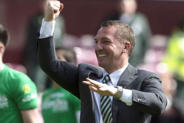 Celtic manager Brendan Rodgers celebrates at full time after his side beat Hearts 5-0 to clinch the Premiership title. Picture: Craig Foy/SNS