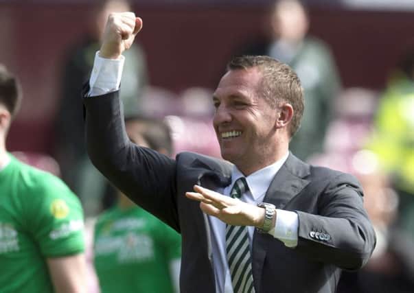 Celtic manager Brendan Rodgers celebrates at full time after his side beat Hearts 5-0 to clinch the Premiership title. Picture: Craig Foy/SNS
