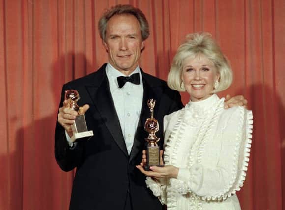 Doris Day with Clint Eastwood in 1989 (AP Photo/Douglas C. Pizac, File)