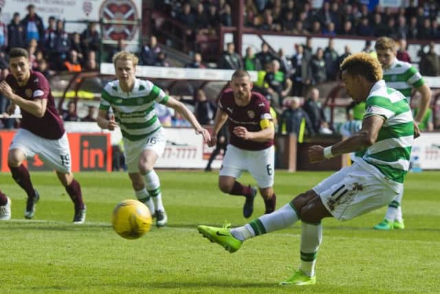 Celtic's Scott Sinclair fires home the penalty to make it 5-0. Picture: SNS