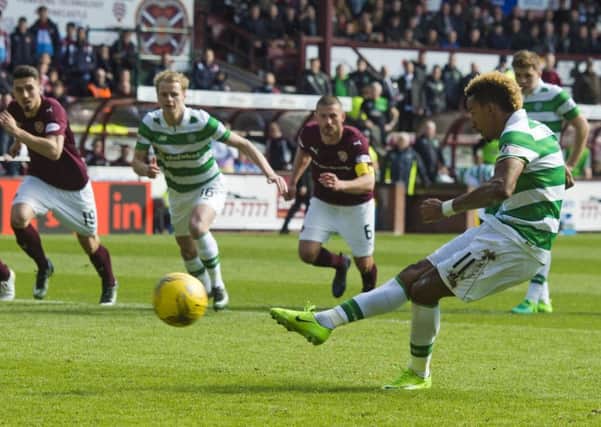 Celtic's Scott Sinclair fires home the penalty to make it 5-0. Picture: SNS