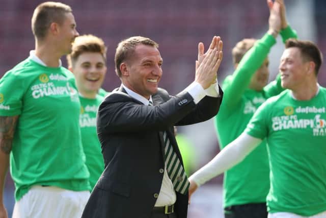 Brendan Rodgers and his Celtic stars celebrate at full-time. Picture: Getty