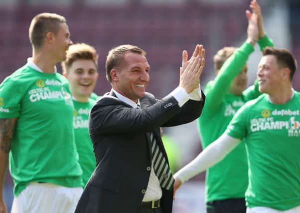 Brendan Rodgers and his Celtic stars celebrate at full-time. Picture: Getty