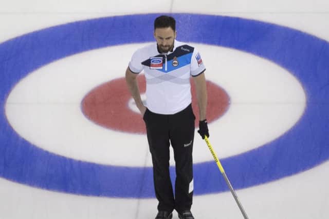 Scotland skip David Murdoch contemplates his next move during his teams 9-4 win over the USA. The Scots also beat Japan 7-4. Picture: Jonathan Hayward/Canadian Press/AP