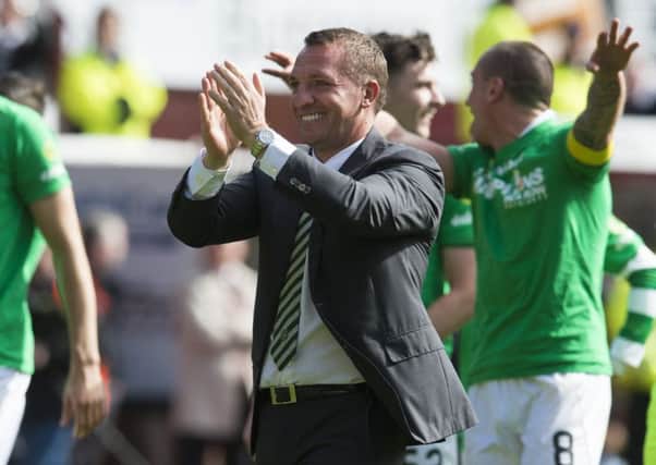 Celtic manager Brendan Rodgers celebrates at full time at Tynecastle after his side clinched the title. Picture: Craig Foy/SNS
