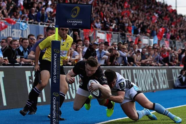 Lee Jones makes a try-saving tackle on Saracens' Chris Ashton. The Warriors wing says his team's focus is now firmly back on the Pro12. Picture: Getty