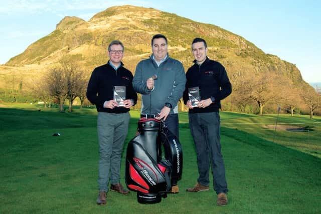 David Hunter, Gavin Dear and Lewis Allison with the data-collecting wristband