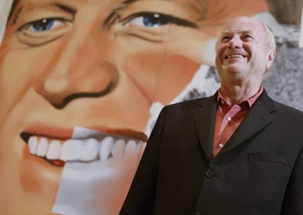 BILBAO, SPAIN: US Pop art movement artist James Rosenquist, poses 12 May 2004 in front of his painting "Elect President" which is part of the new Guggenheim Bilbao Museum exhibition "James Rosenquist: A Retrospective", the first survey of the artist's work in all media in more than thirty years, that will remain on view in the northern Spanish Basque city of Bilbao from May 13th through October 17, 2004. AFP PHOTO / RAFA RIVAS (Photo credit should read RAFA RIVAS/AFP/Getty Images)