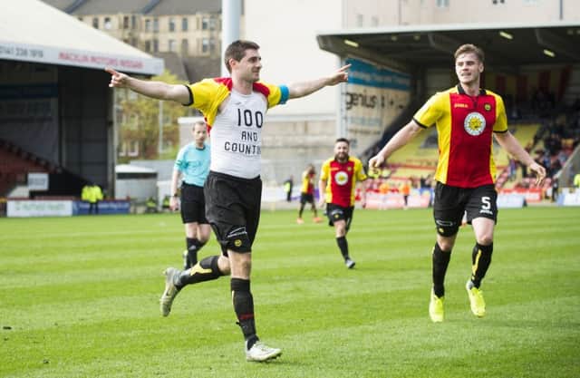Partick Thistle's Kris Doolan celebrates after he scoring his 100th goal for the club. Picture: SNS