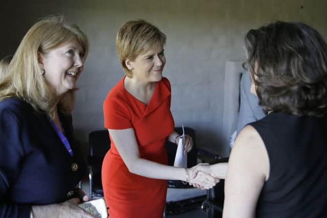 First Minister Nicola Sturgeon shakes hands before taking part in a round table discussion with angel investors in California. Picture: AP