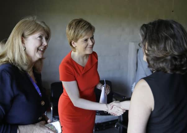 First Minister Nicola Sturgeon shakes hands before taking part in a round table discussion with angel investors in California. Picture: AP