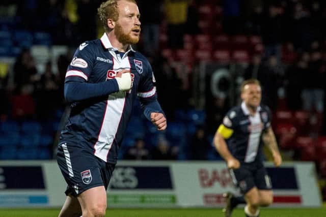 Ross County's Liam Boyce celebrates scoring a late penalty to make it 2-1 against Dundee. Picture: SNS Group