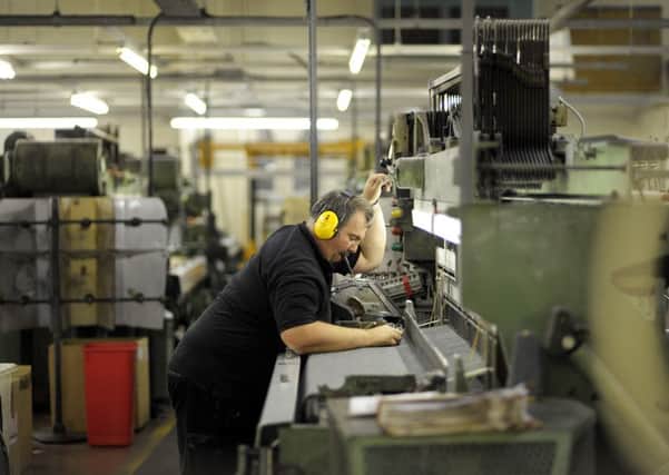 While the UK economy as a whole grew in the last quarter of last year, the Scottish economy contracted. Picture: Andy Buchanan /AFP/Getty Images