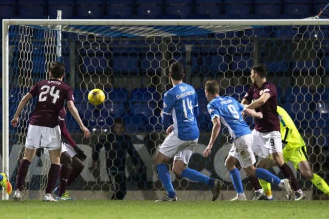 St Johnstone's Joe Shaughnessy (centre) scores the winning goal. Picture: SNS