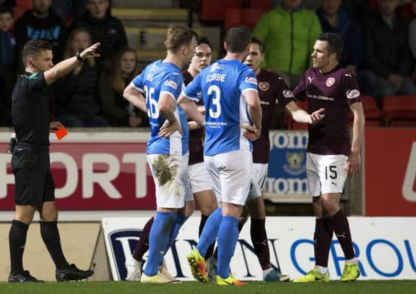 Referee Nick Walsh dismisses Hearts winger Sam Nicholson (second from right) in the second half at McDiarmid Park. Picture: SNS
