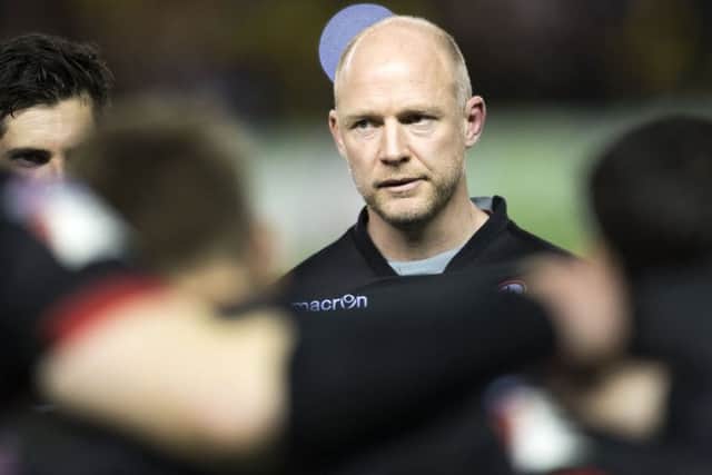 Interim Edinburgh head coach Duncan Hodge speaks to his players after the defeat by La Rochelle at Murrayfield. Picture: SNS