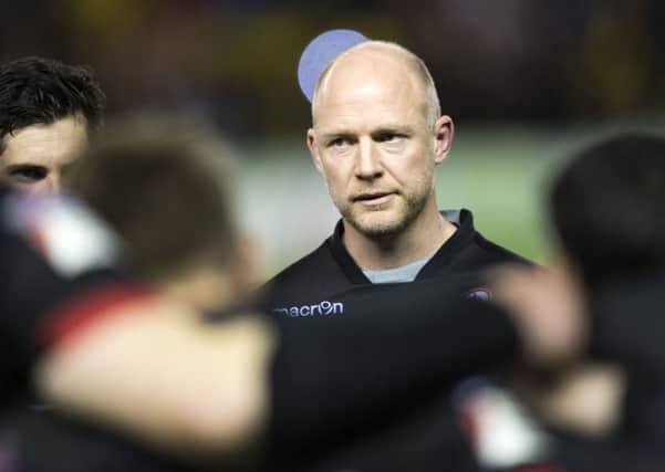Interim Edinburgh head coach Duncan Hodge speaks to his players after the defeat by La Rochelle at Murrayfield. Picture: SNS