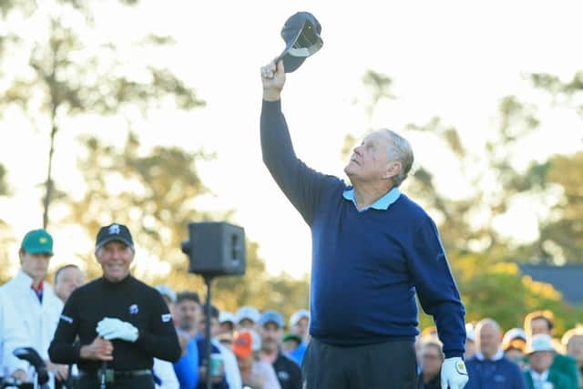 Honorary starter Jack Nicklaus holds up his hat in tribute to Arnold Palmer during the first tee ceremony at Augusta. Picture: Andrew Redington/Getty Images