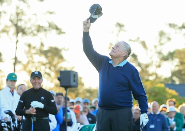 Honorary starter Jack Nicklaus holds up his hat in tribute to Arnold Palmer during the first tee ceremony at Augusta.  Picture: Andrew Redington/Getty Images