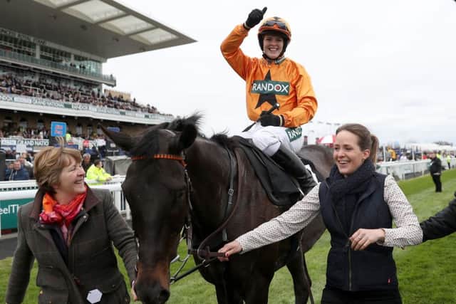 Lizzie Kelly celebrates winning on Tea For Tea in the Betway Bowl Chase. Picture: PA.