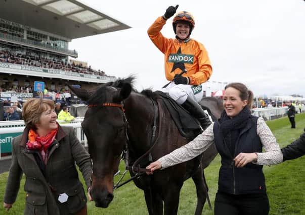 Lizzie Kelly celebrates winning on Tea For Tea in the Betway Bowl Chase. Picture: PA.