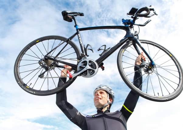Mark Beaumont sets off from Edinburgh Airport for his round the world cycle ride in 80 days. Picture: Toby Williams