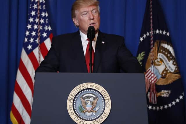 President Donald Trump speaks at Mar-a-Lago in Palm Beach, Florida, after the U.S. fired a barrage of cruise missiles into Syria. (AP Photo/Alex Brandon)