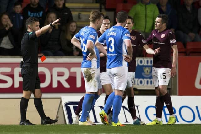 Hearts' Sam Nicholson (second from right) being sent off against St Johnstone. Picture: SNS