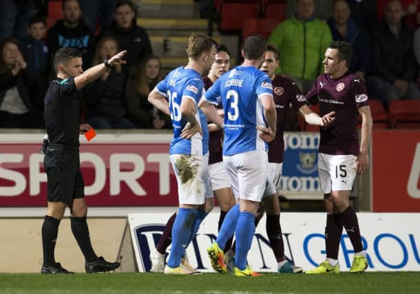 Hearts' Sam Nicholson (second from right) being sent off against St Johnstone. Picture: SNS