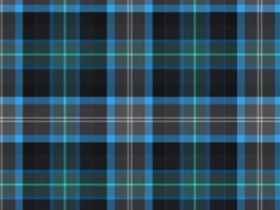 The new tartan uses the same colours as in Prestwick Airport's logo. Picture: Prestwick Airport