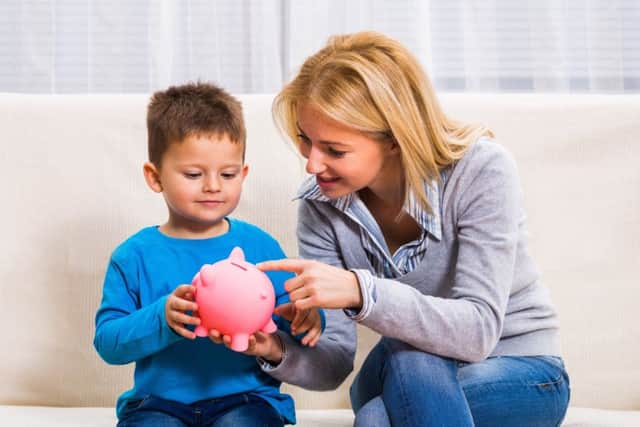Children should be encouraged to save some of their pocket money. Picture: iStockphoto/Getty