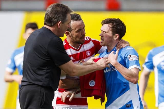 Danny Swanson (right) had to be restrained following his confrontation with team-mate Richard Foster (not pictured). Picture: SNS