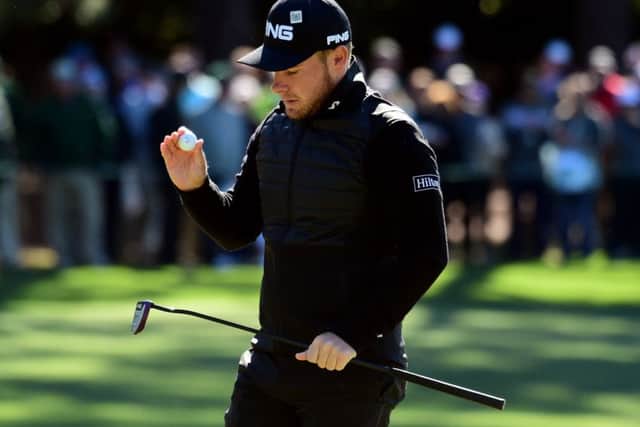 Tyrrell Hatton reacts to his bogey on the first hole during the second round of the 2017 Masters. Picture: Harry How/Getty Images