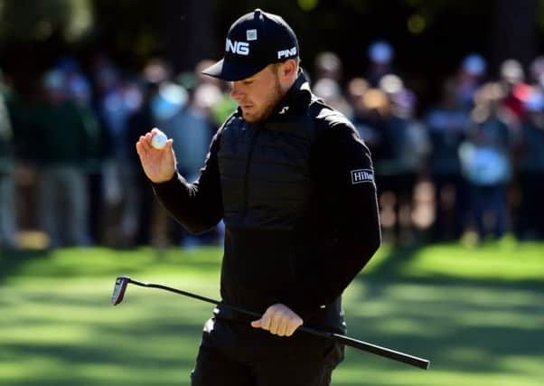 Tyrrell Hatton reacts to his bogey on the first hole during the second round of the 2017 Masters. Picture: Harry How/Getty Images