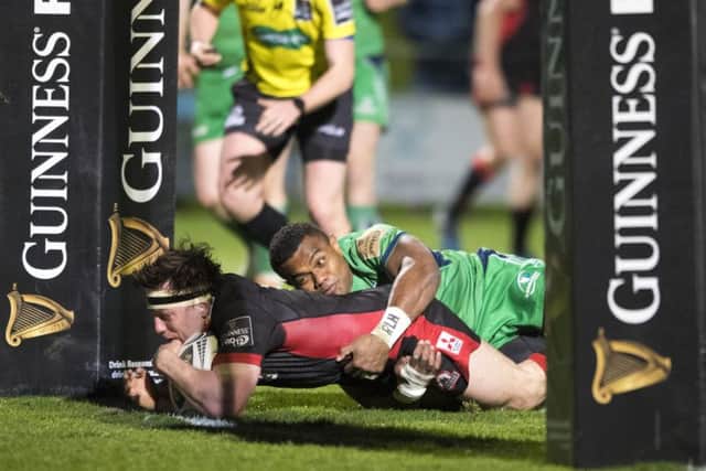 Edinburgh's Hamish Watson dives under the posts to score his side's second try against Connacht. Picture: SNS/SRU