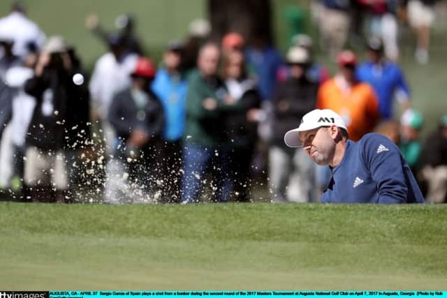 Sergio Garcia blasts out of a bunker on his way to  a second-round 69. Picture: Getty.