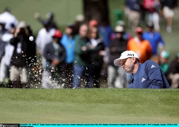 Sergio Garcia blasts out of a bunker on his way to  a second-round 69. Picture: Getty.