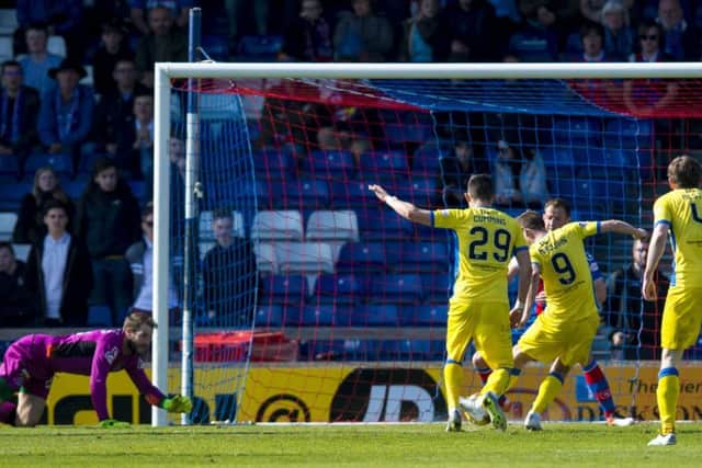 Steven MacLean puts Saints in front in Inverness. Pic: SNS/Sammy Turner